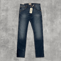Męskie jeansy slim fit sweet_szop Wrangler w kolorze niebieskim z subtelnymi przetarciami i oryginalnymi metkami